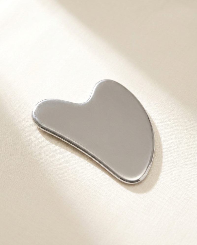 Cryo Gua Sha, bright morning light on warm porcelain