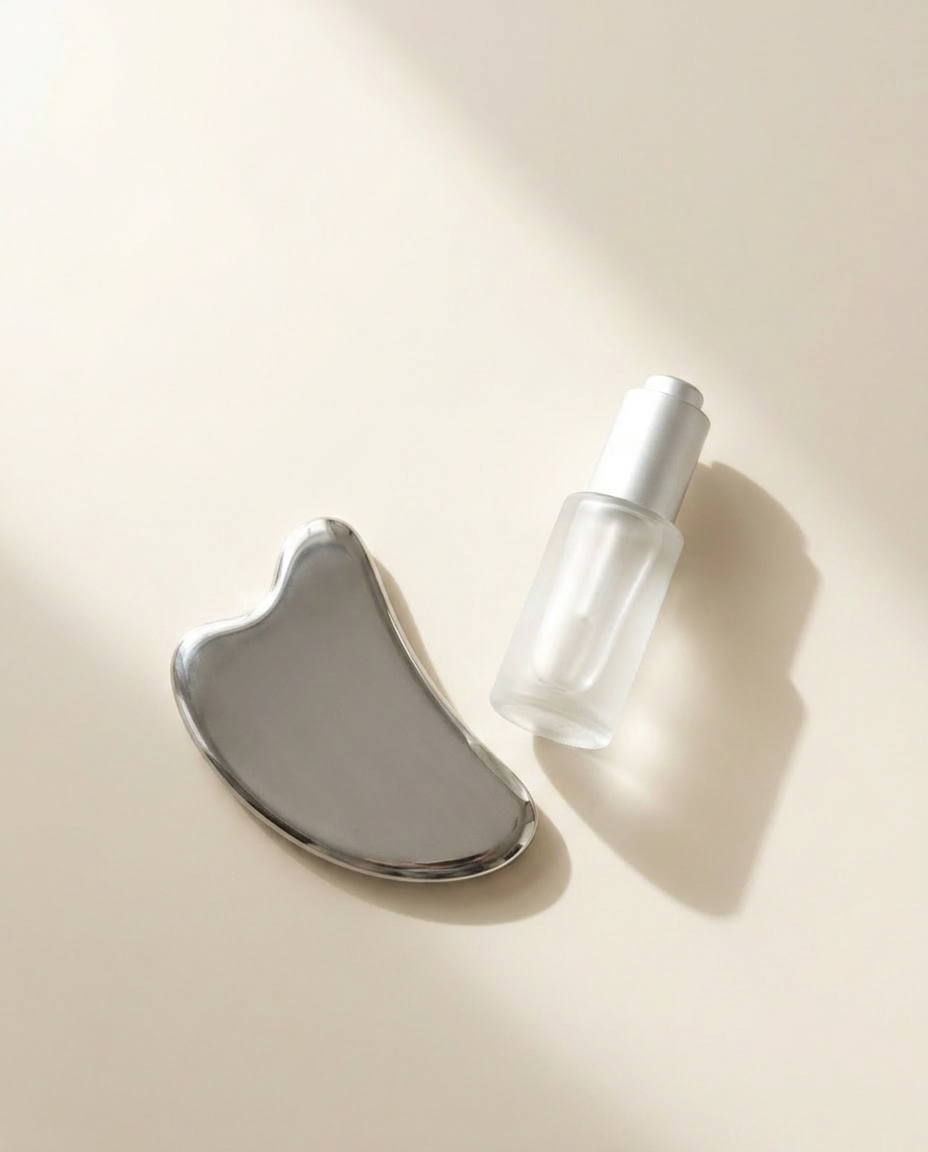 The Sculpt Counter set: heavyweight steel gua sha and squalane glide oil